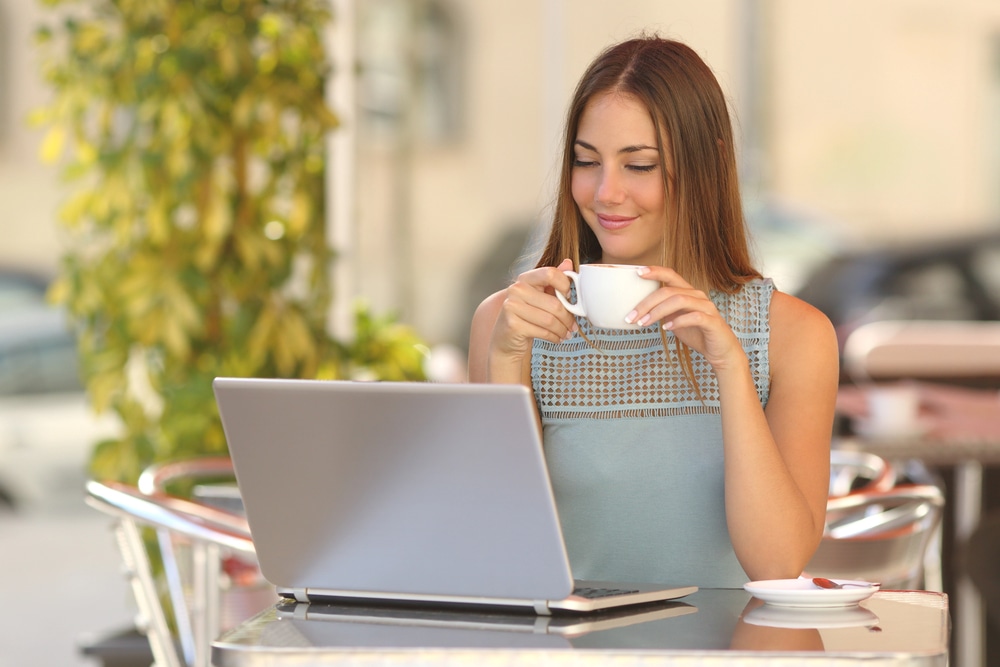 Confident Business Owner Enjoying Results Of Website, Seo And Google Ads Working For Her